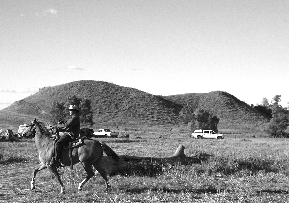 Sioux tribal member on horse